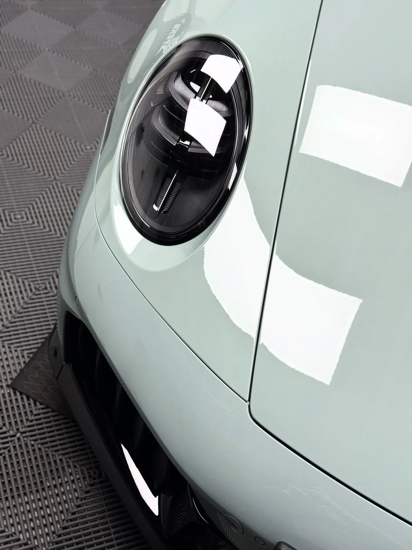 Porsche headlight with SunTek PPF
